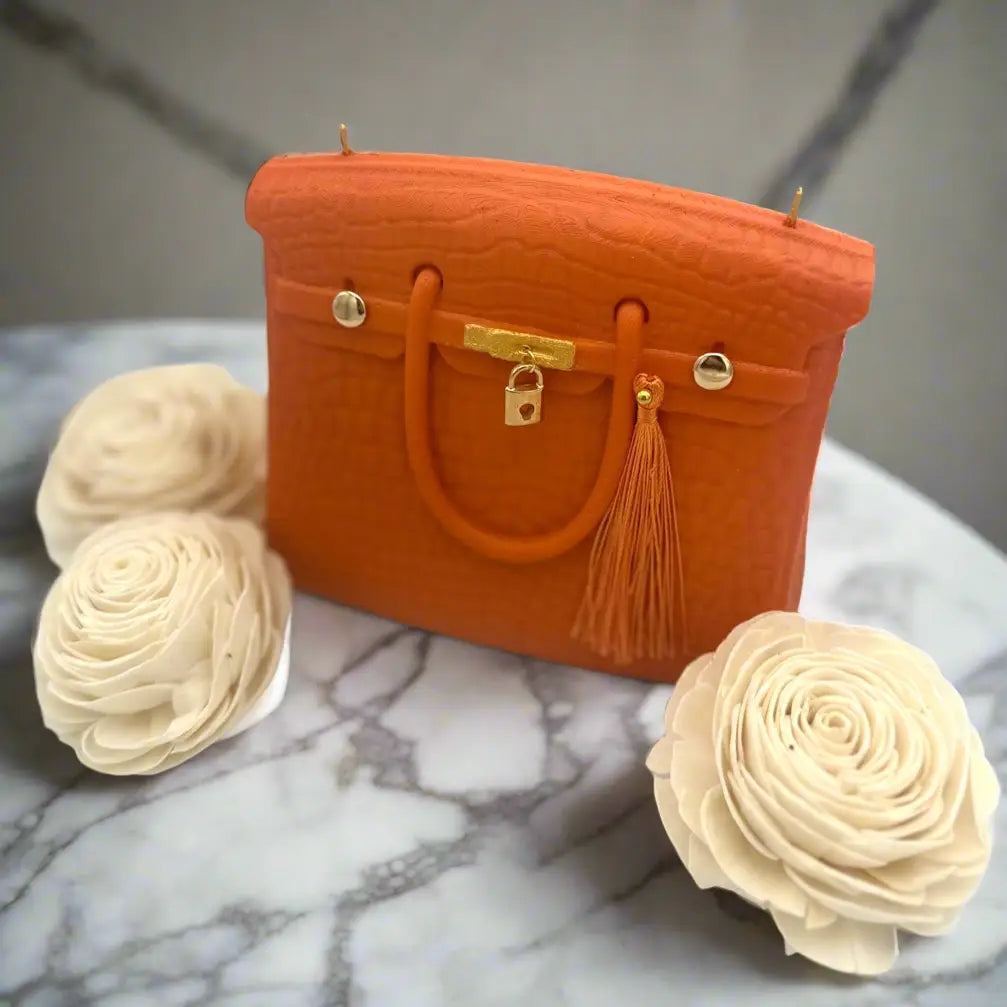 The Iconic Couture Candle Purse Collection