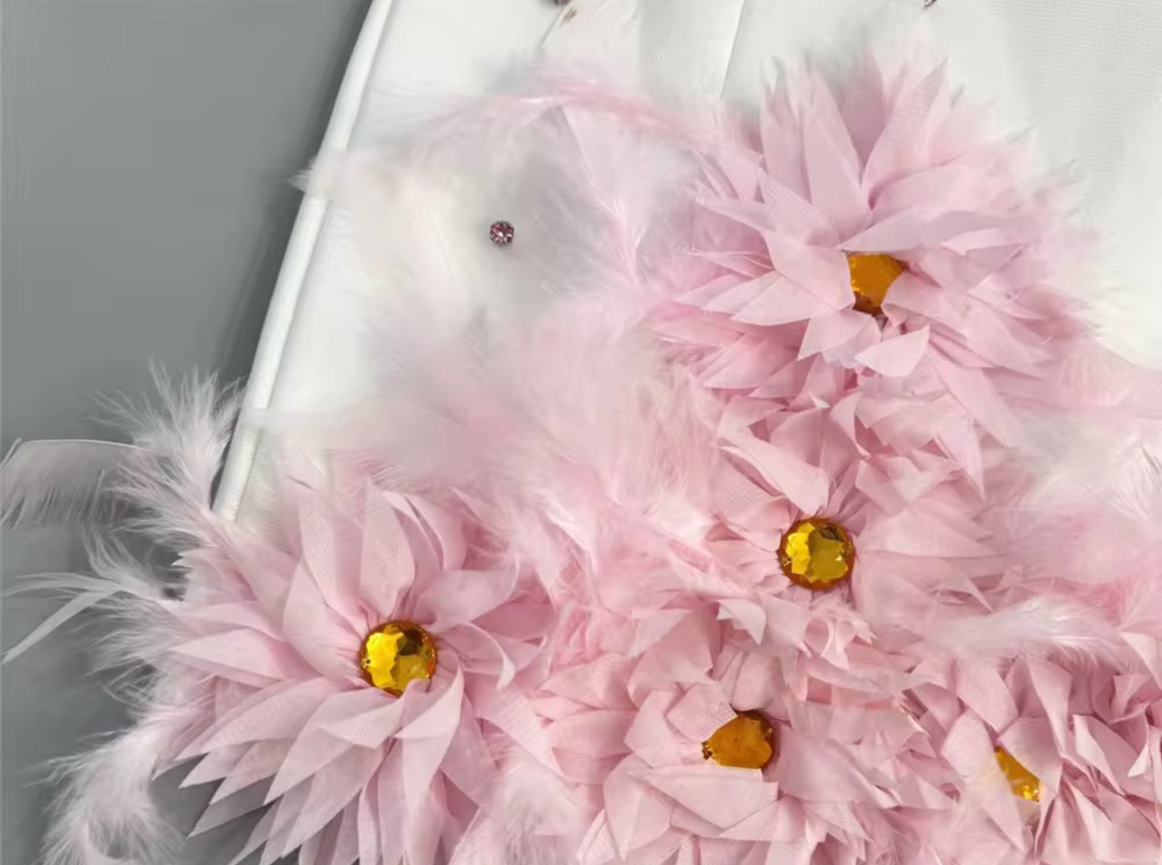 Tawni White Strapless Sweetheart Neck Mini Dress with Pink Crystals and Feather Embellishments